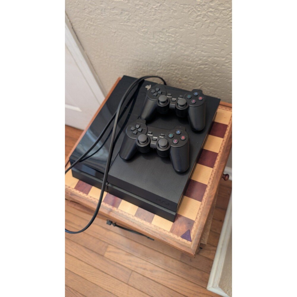 Sony 500GB Black PlayStation 4 with 2 PS4 compatible controllers
